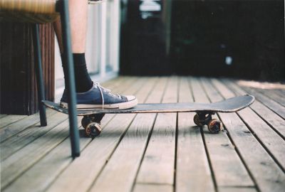 Low section of man on skateboard