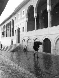 People in front of building