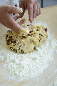 Midsection of person preparing food