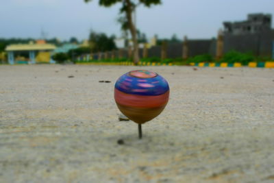 Close-up of multi colored umbrella against sky