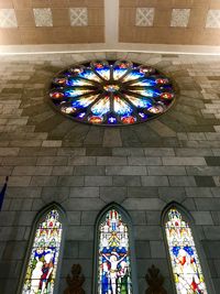 Low angle view of multi colored ceiling in temple