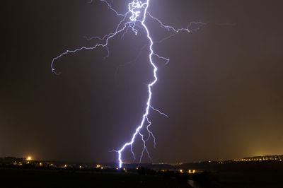 Lightning in sky at night