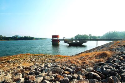 Scenic view of river against clear sky