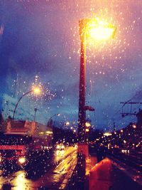 View of illuminated street at night