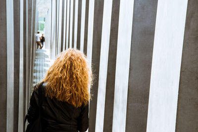 Woman standing at monument