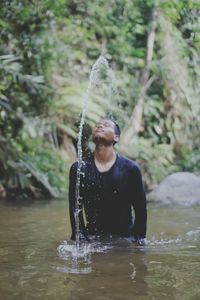 Woman standing in water