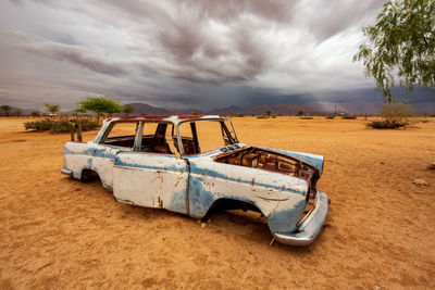 Rusty car wreck in solitaire, namibia