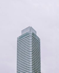 Low angle view of modern building against clear sky