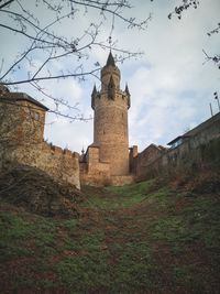 Low angle view of historic building against sky