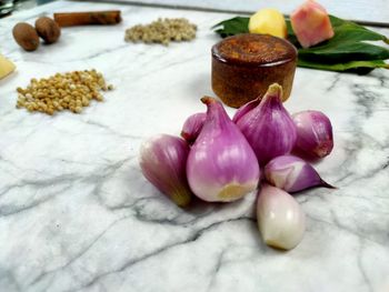 Close-up of purple flowers on table