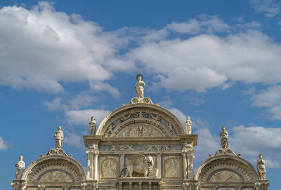Low angle view of historic building against sky
