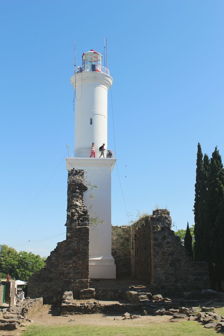 clear sky, lighthouse, building exterior, protection, built structure, architecture, day, outdoors, tree, nature, sky, no people