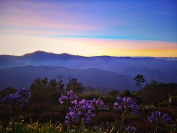 Scenic view of mountains against sky during sunset
