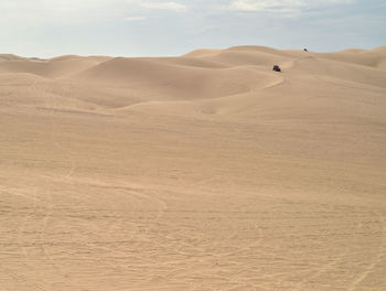 Scenic view of desert against sky