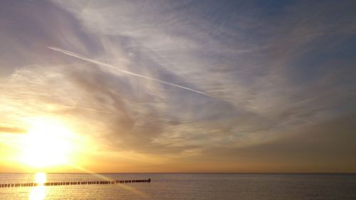 Scenic view of sea at sunset
