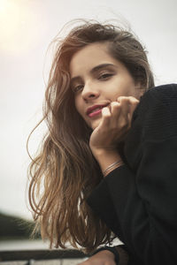 Portrait of beautiful woman with long hair
