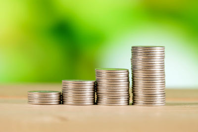 Stack of coins on table