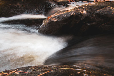 Close-up of water flowing through rocks