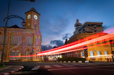 Light trails on road at dusk