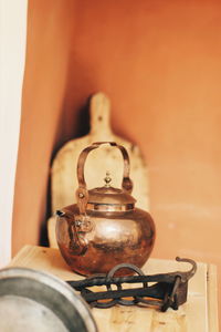 Close-up of wineglass on table at home