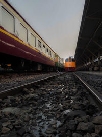 Train on railroad track against sky