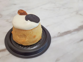 Close-up of cake in plate on table