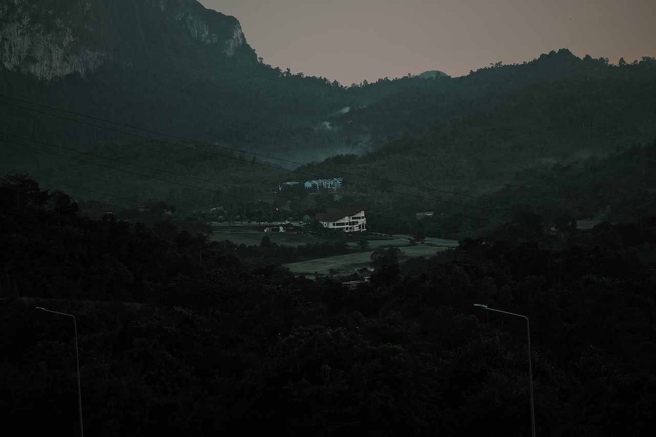 HIGH ANGLE VIEW OF LANDSCAPE AGAINST SKY DURING FOGGY WEATHER