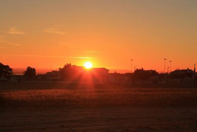 Scenic view of landscape at sunset