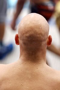 Close-up portrait of shirtless man