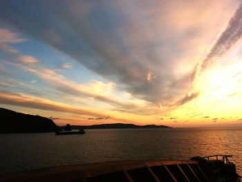 Scenic view of calm sea at sunset