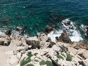 High angle view of rocks on beach