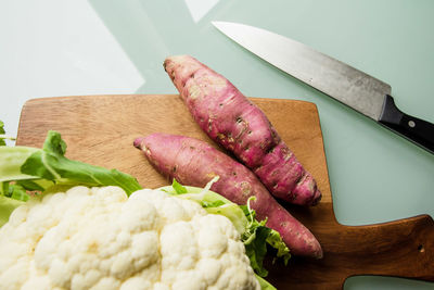 High angle view of chopped vegetables on cutting board