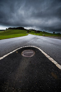 Road against storm clouds