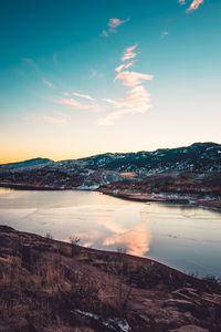 Scenic view of landscape against sky during sunset