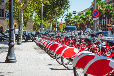 Bicycles parked on street in city