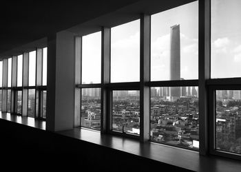 Buildings seen through glass window