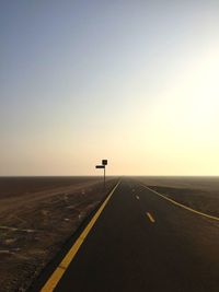 Scenic view of road against clear sky