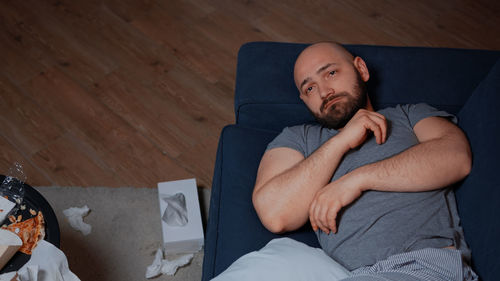 Low section of woman sitting on floor