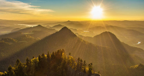 Scenic view of mountains against sky during sunset
