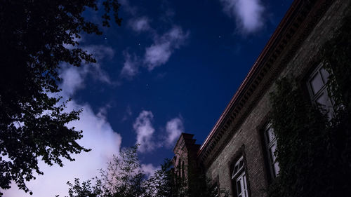 Low angle view of building against blue sky