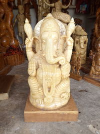 Buddha statue in temple outside building