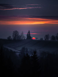 Dramatic sunrise over the autumn fields. colorful skies. beautiful fall scenery of northern europe.