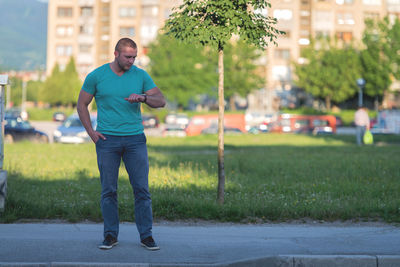 Full length of man standing on field