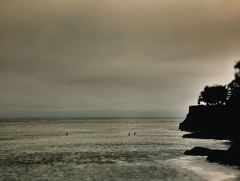 Scenic view of sea against cloudy sky