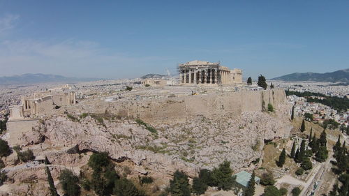 Ancient buildings against blue sky