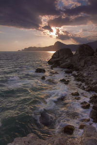 Scenic view of sea against sky during sunset