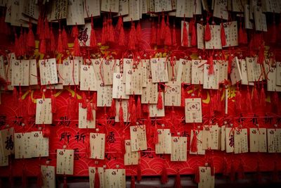 Full frame shot of praying flags hanging outside temple