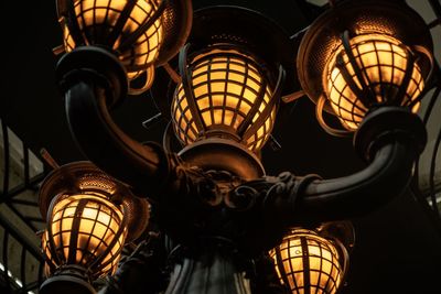 Low angle view of illuminated chandelier