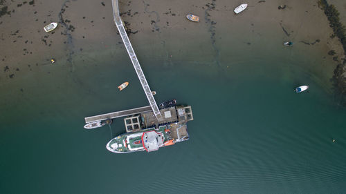 Aerial view of boats moored at shore