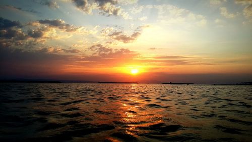 Scenic view of sea at sunset